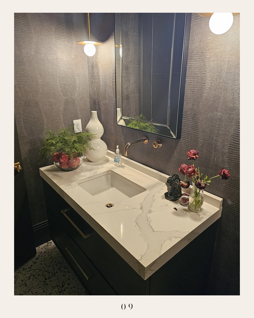 A Touch of Stone carousel slide: quartz vanity in a dark powder room